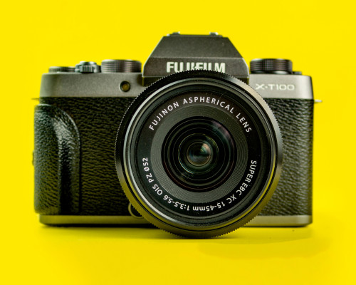 retro camera yellow background