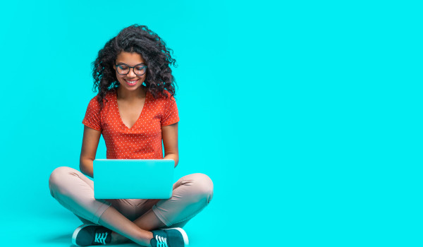 woman crossed legged laptop