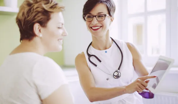 Image of doctor talking to patient