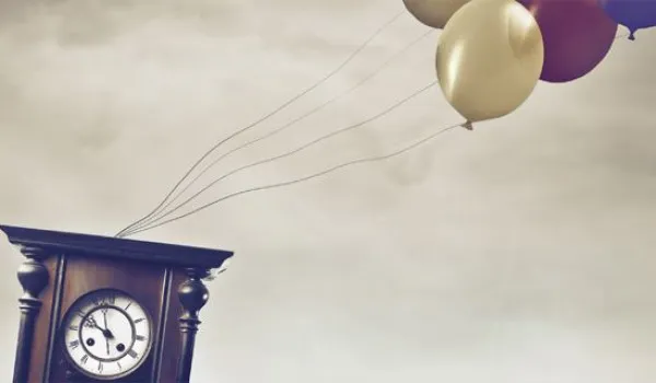 Image of clock and balloons