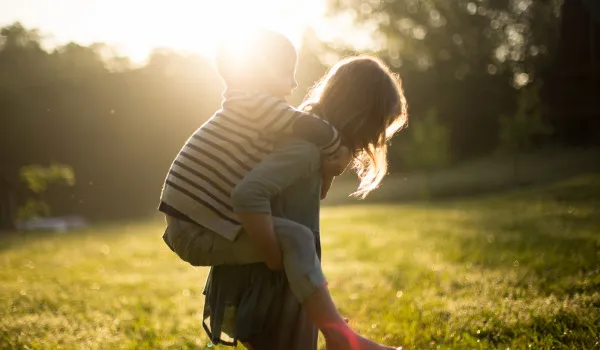 Image of Two kids playing piggy back