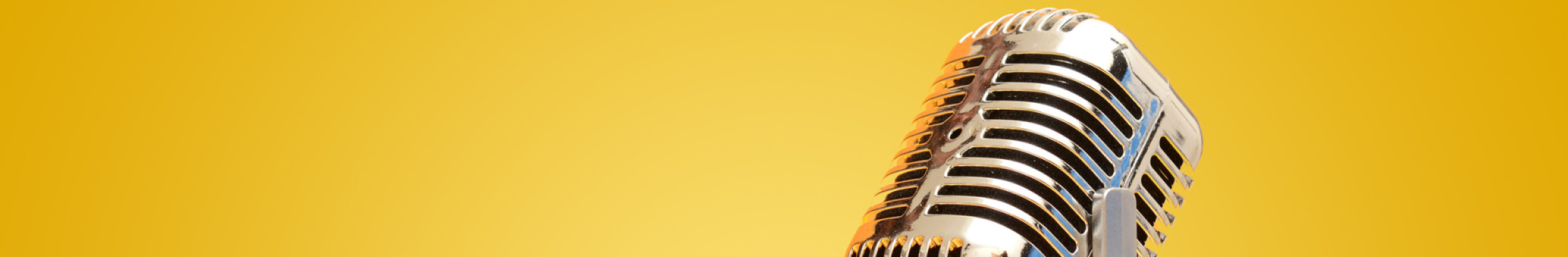 retro microphone on yellow background