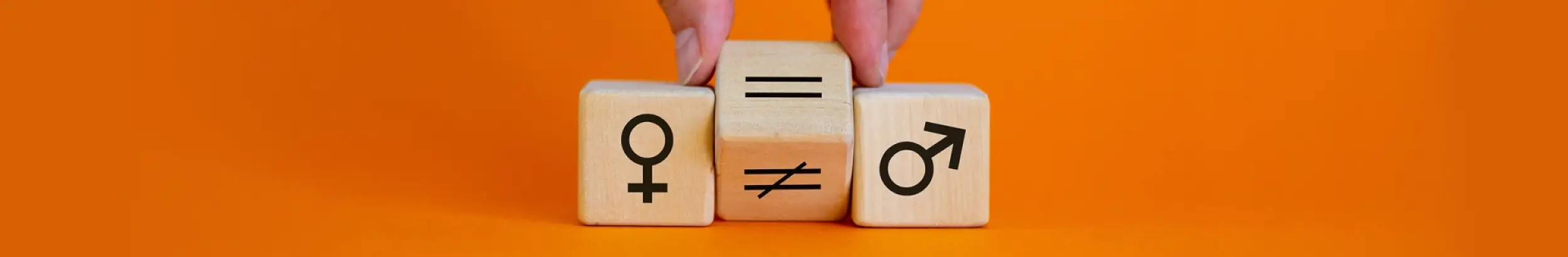 A hand placing an 'equals' symbol between female and male symbols