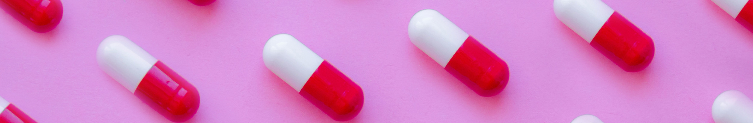 tablets on a pink background