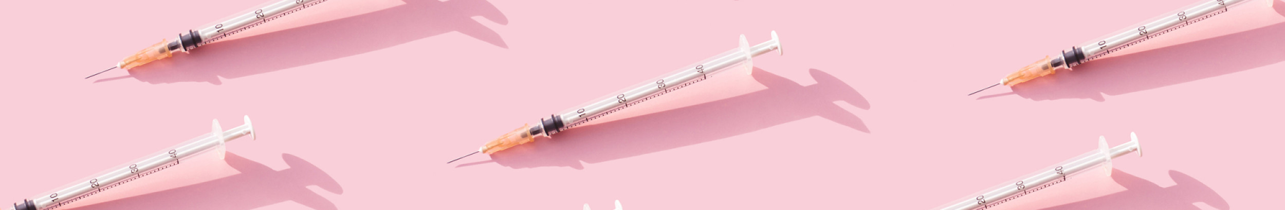 syringes pink background