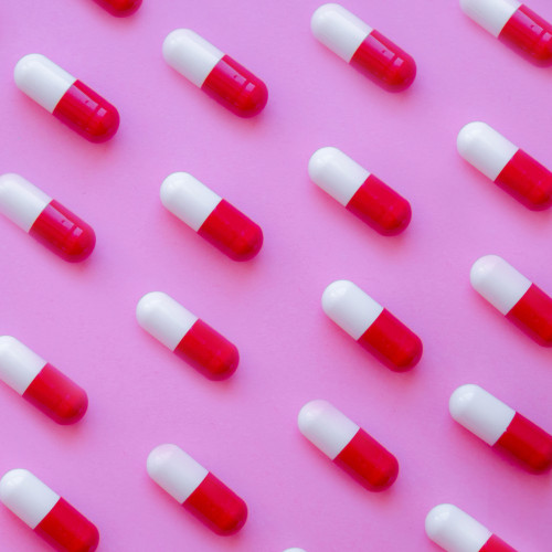 tablets on a pink background