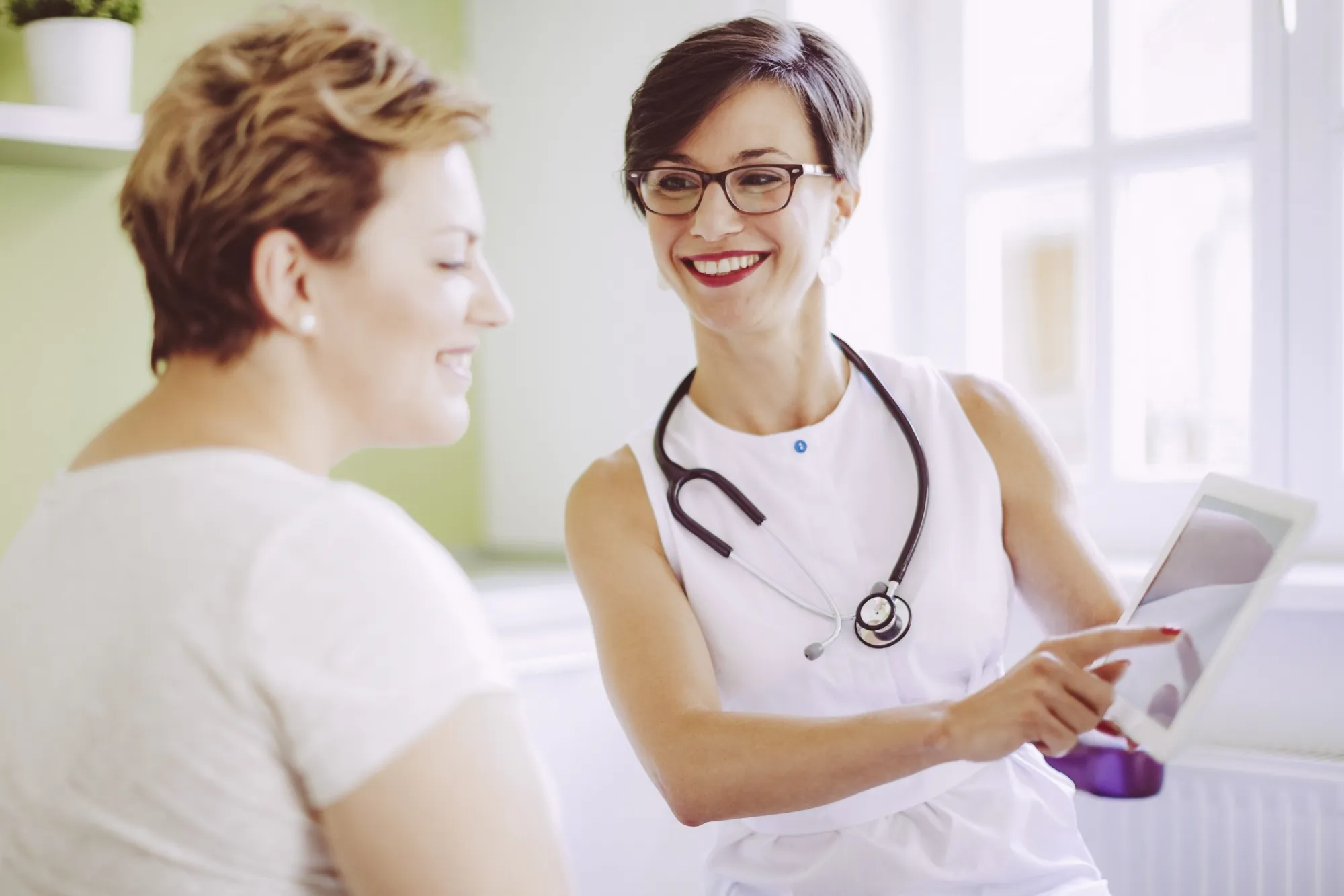 Image of doctor talking to patient