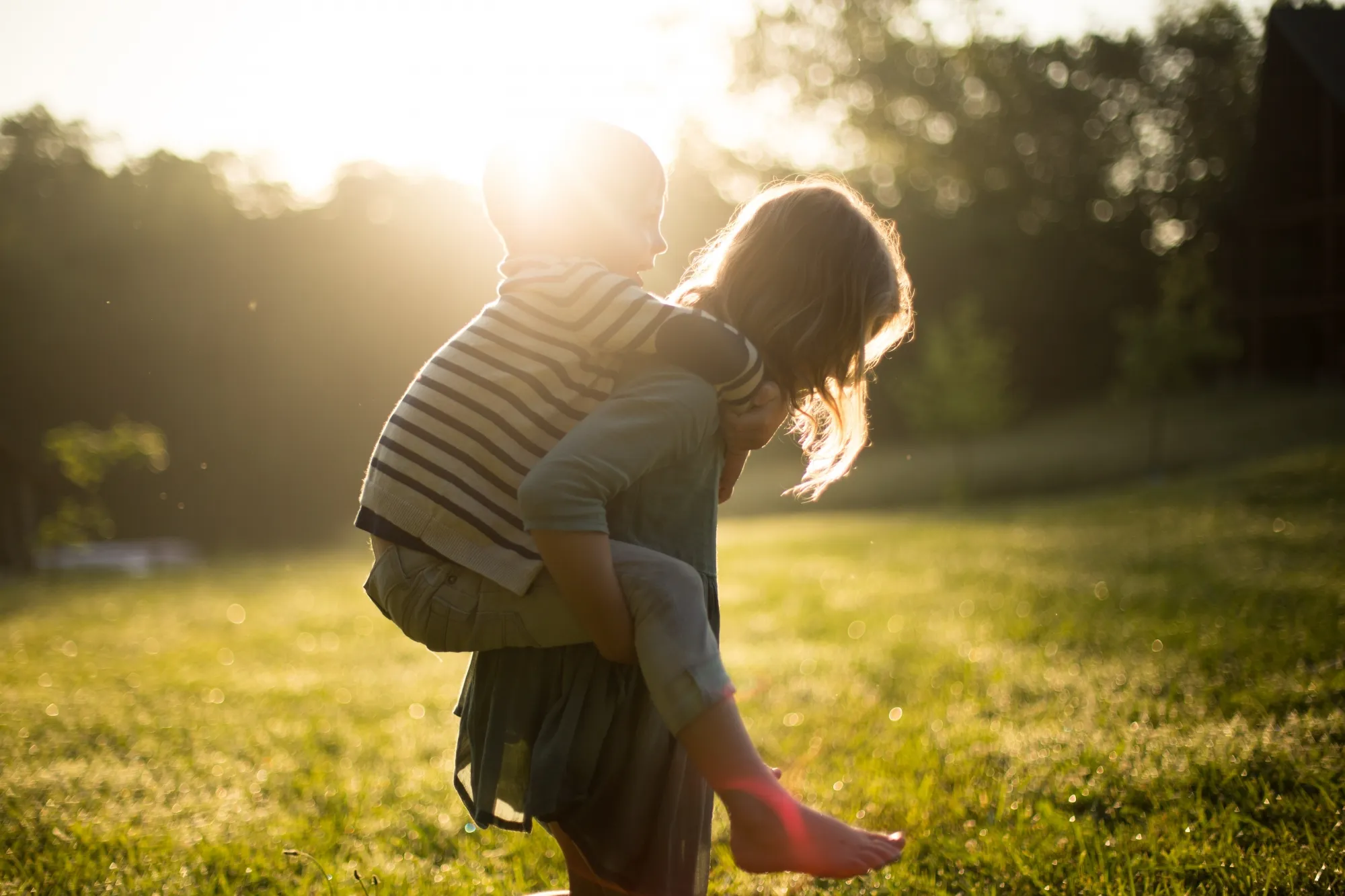 Image of Two kids playing piggy back