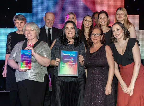 Image of staff at an awards event